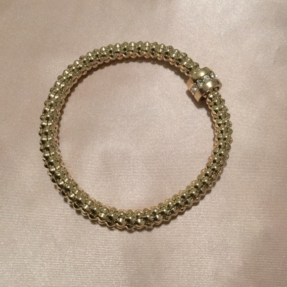 Gold-colored stretchy bracelet - Picture 1 of 2